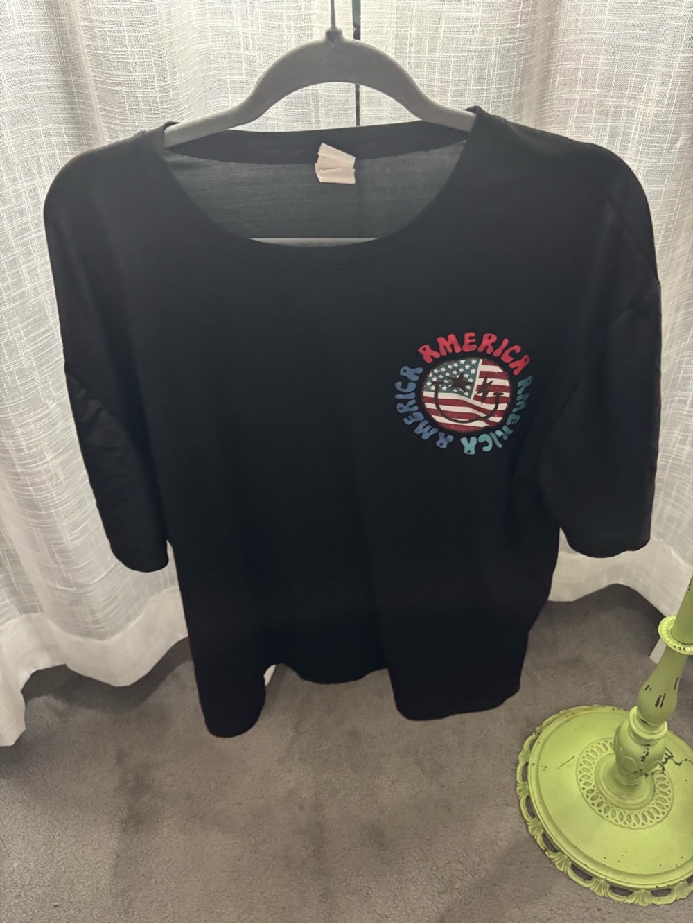 Black Graphic Tee with Patriotic Flag Emblem